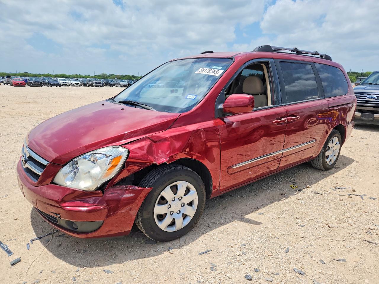 2008 Hyundai Entourage GLS, VIN KNDMC233086054840 — Бок