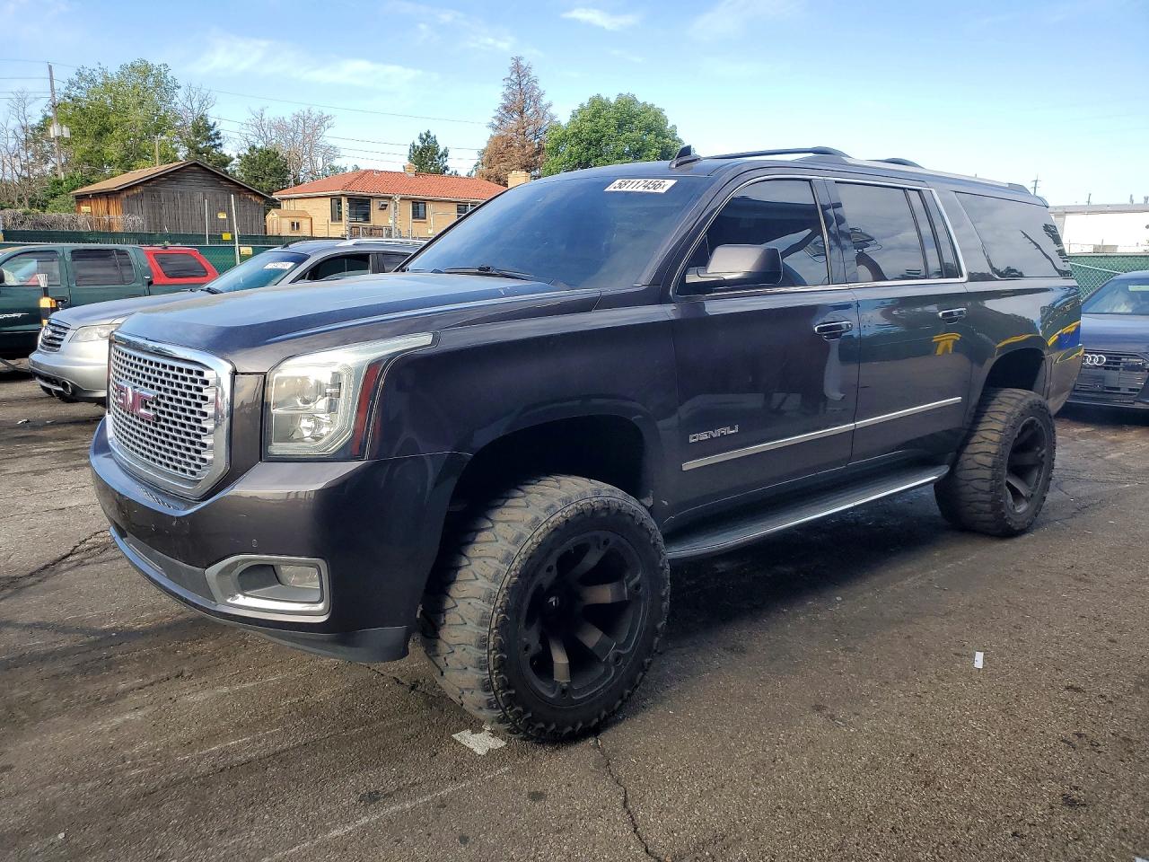 2016 GMC Yukon XL Denali, VIN 1GKS2HKJ5GR271542 — Rear end