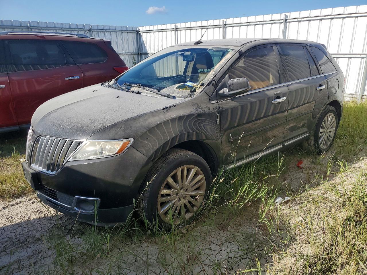 2013 Lincoln MKX, VIN 2LMDJ6JK9DBL30242 — Vandalism