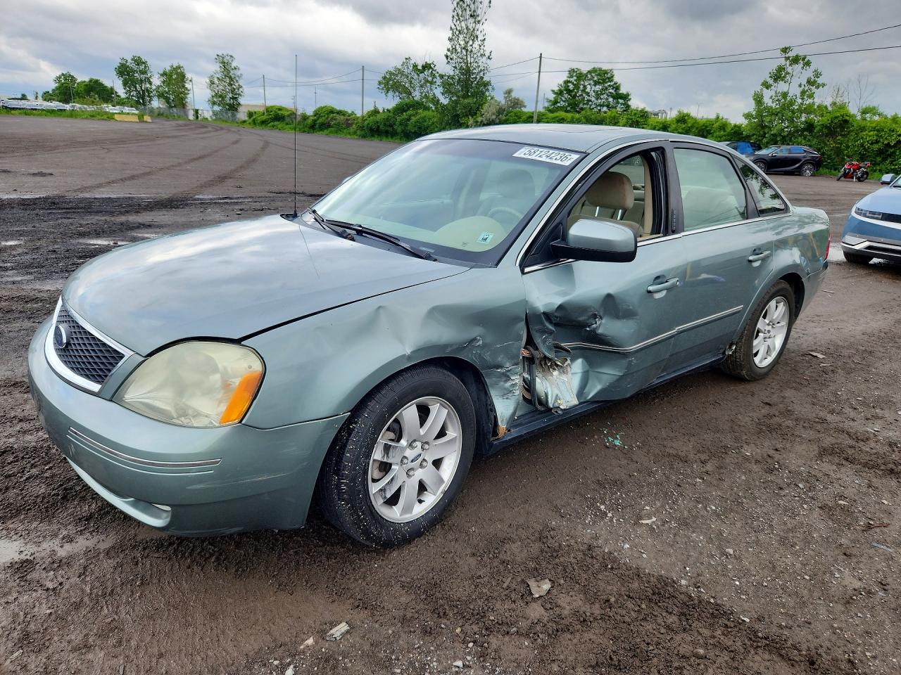 2005 Ford Five Hundred SEL, VIN 1FAFP241X5G153686 — Side