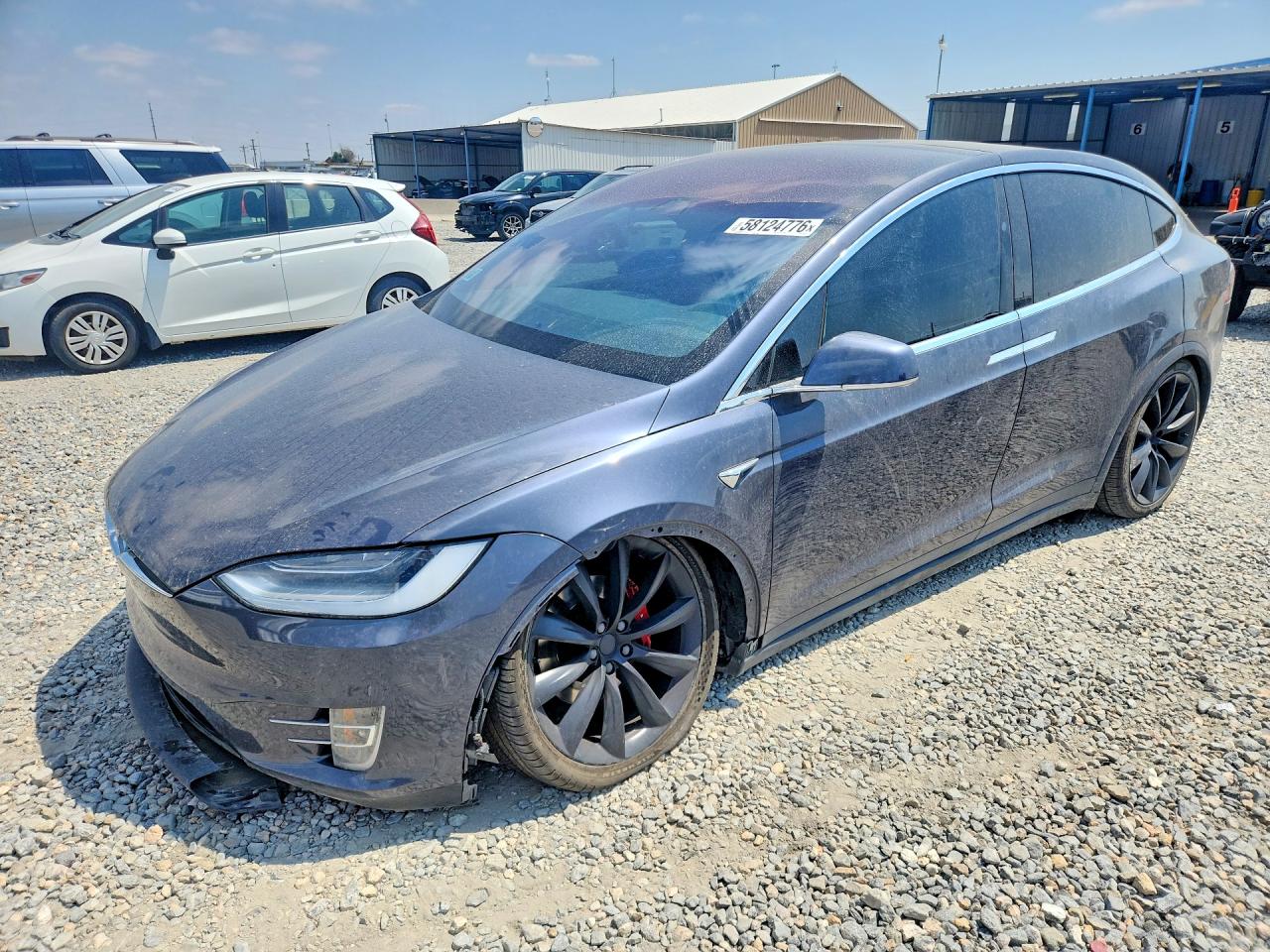 2019 Tesla Model X P100D, VIN 5YJXCBE41KF182065 — Front end