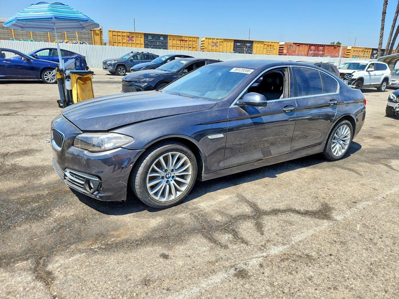 2014 BMW 5 Series 528i, VIN WBA5A5C58ED507216 — Side