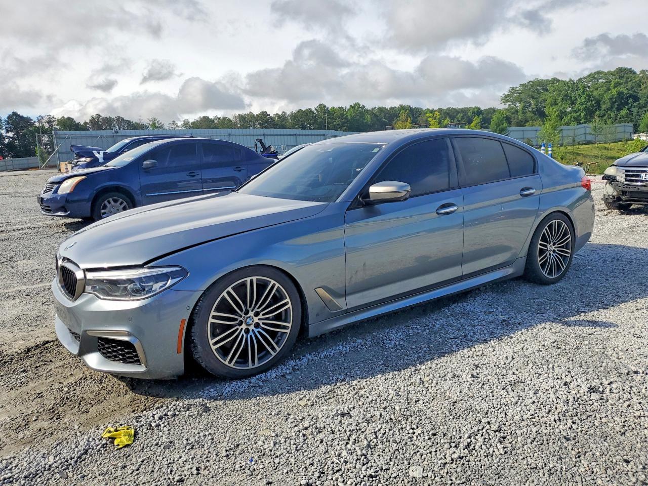 2018 BMW 5 Series M550i xDrive, VIN WBAJB9C5XJB287277 — Minor dents and scratches