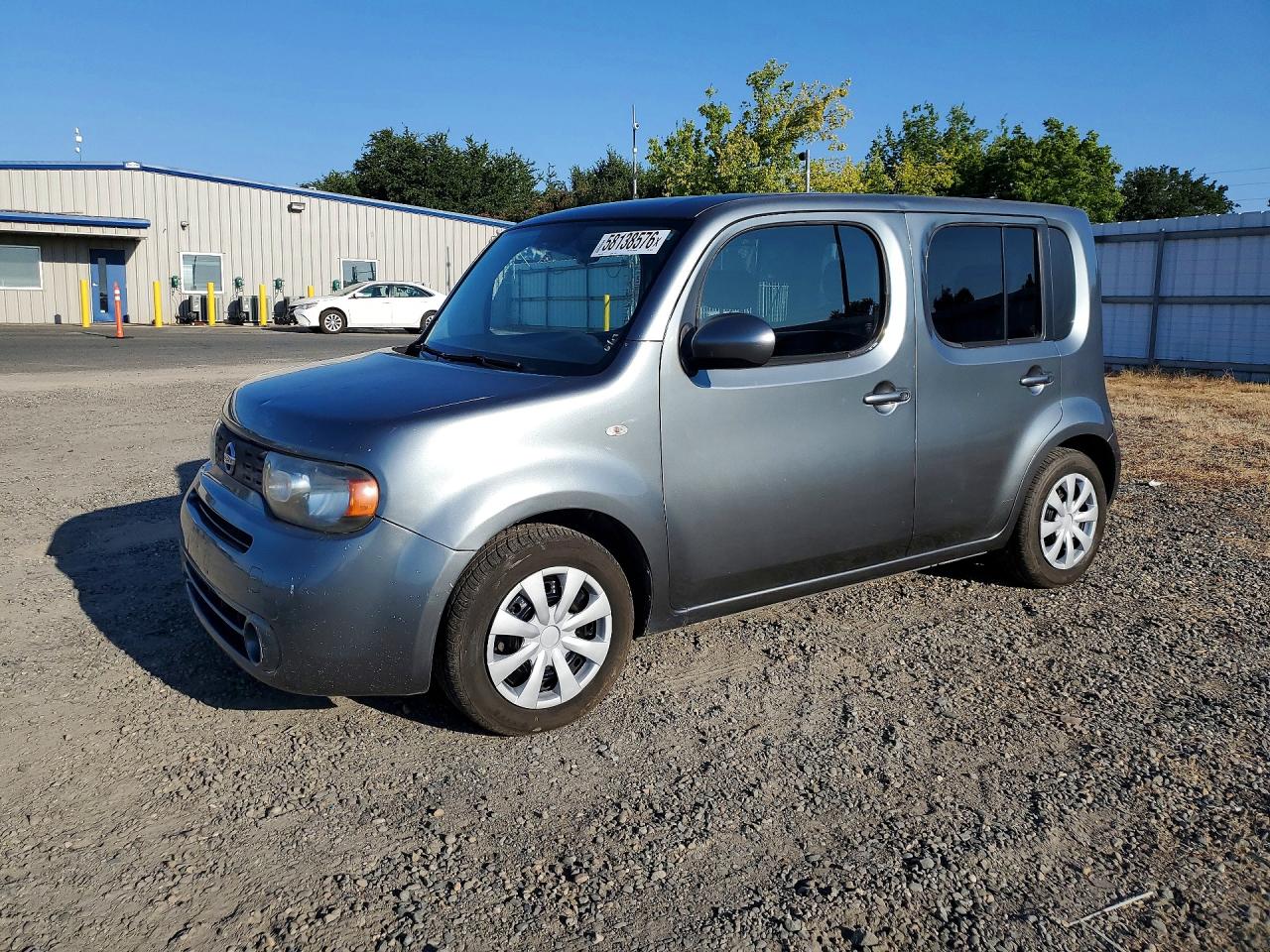 2010 Nissan Cube S, VIN JN8AZ2KRXAT165169 — Side