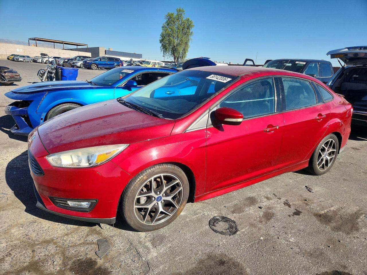 2015 Ford Focus SE, VIN 1FADP3FE0FL248425 — Minor dents and scratches