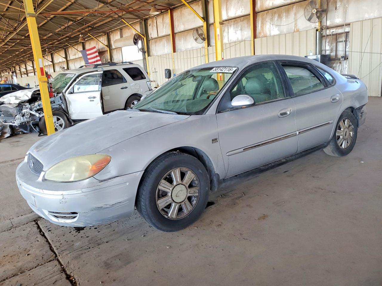 2004 Ford Taurus SEL, VIN 1FAFP56S54A150624 — Side