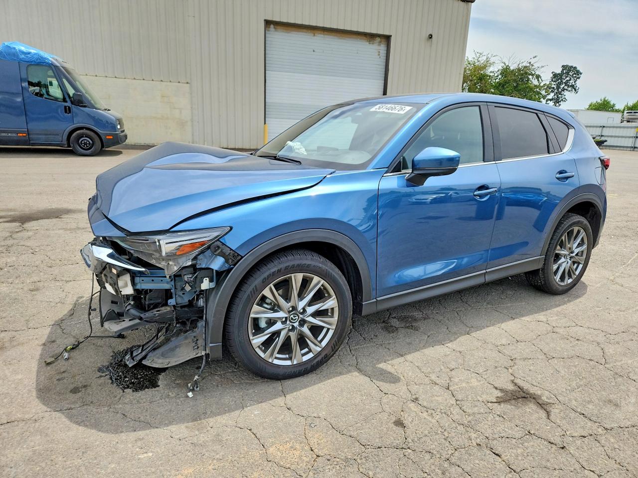 2021 Mazda CX-5 Signature, VIN JM3KFBEYXM0456814 — Front end