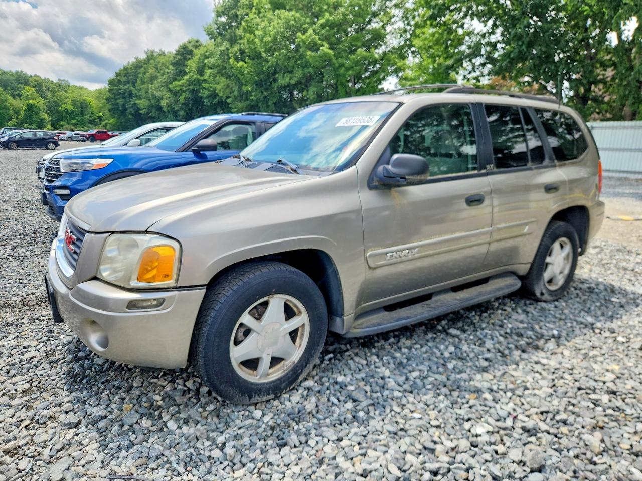 2002 GMC Envoy SLE, VIN 1GKDT13S322106076 — Minor dents and scratches