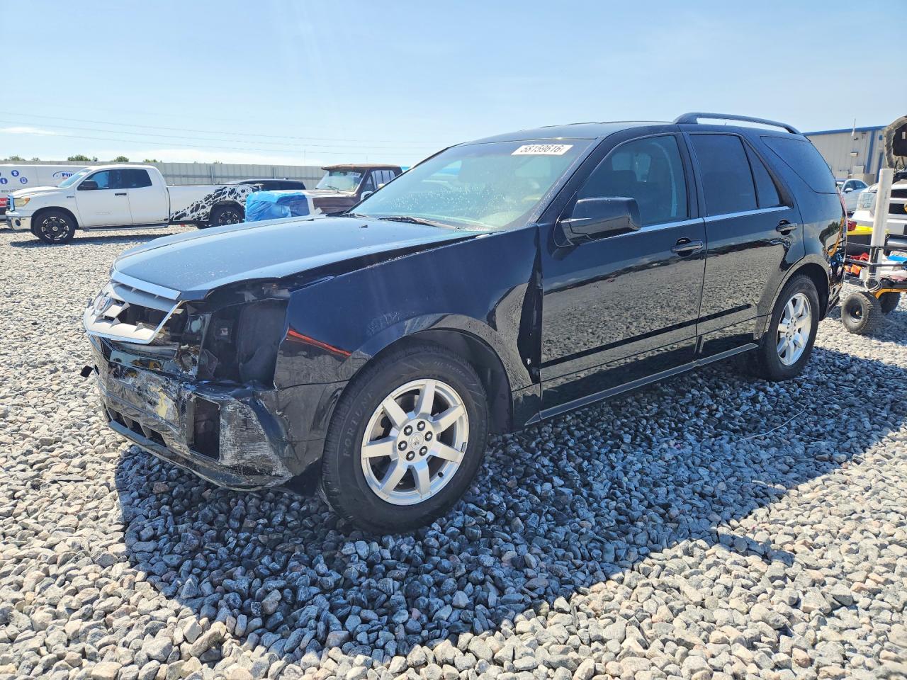 2009 Cadillac SRX RWD, VIN 1GYEE637290155594 — Перед