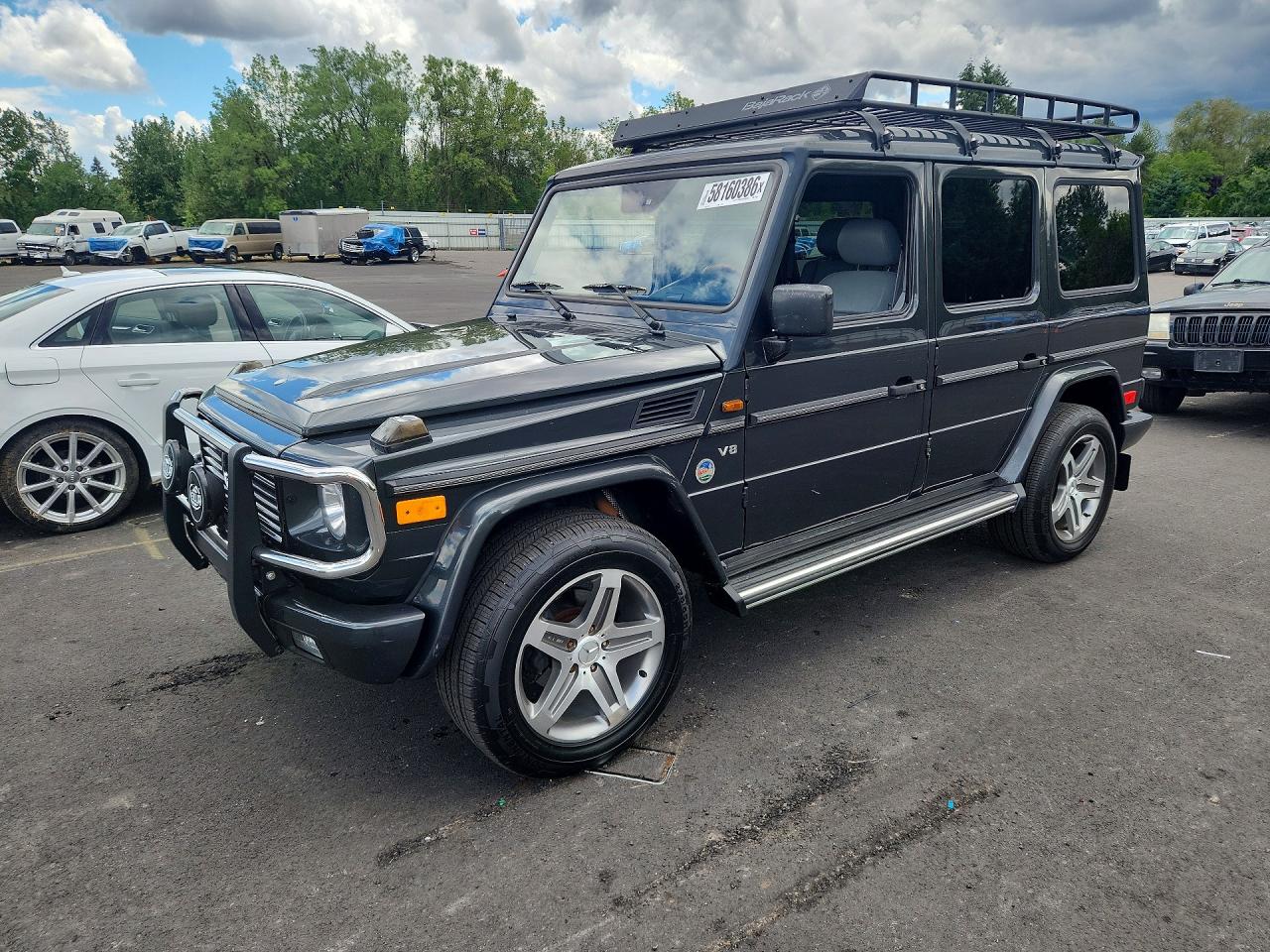 2002 Mercedes-Benz G 500, VIN WDCYR49EX2X128247 — Minor dents and scratches