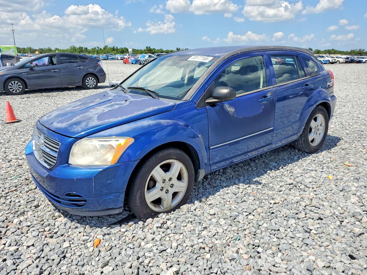 2009 Dodge Caliber SXT, VIN 1B3HB48AX9D136063 — Механическое