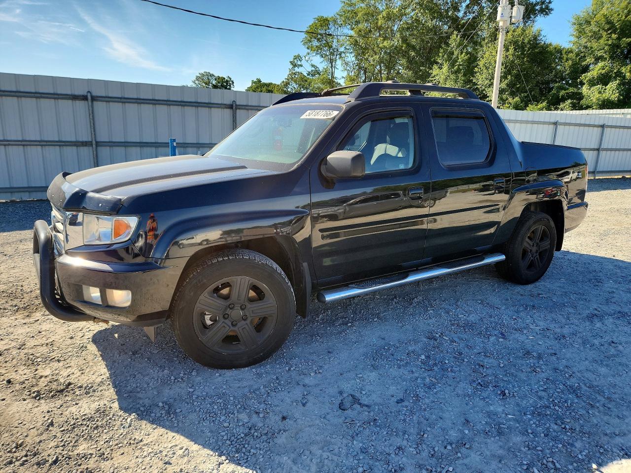 2012 Honda Ridgeline RTL, VIN 5FPYK1F54CB455453 — Side