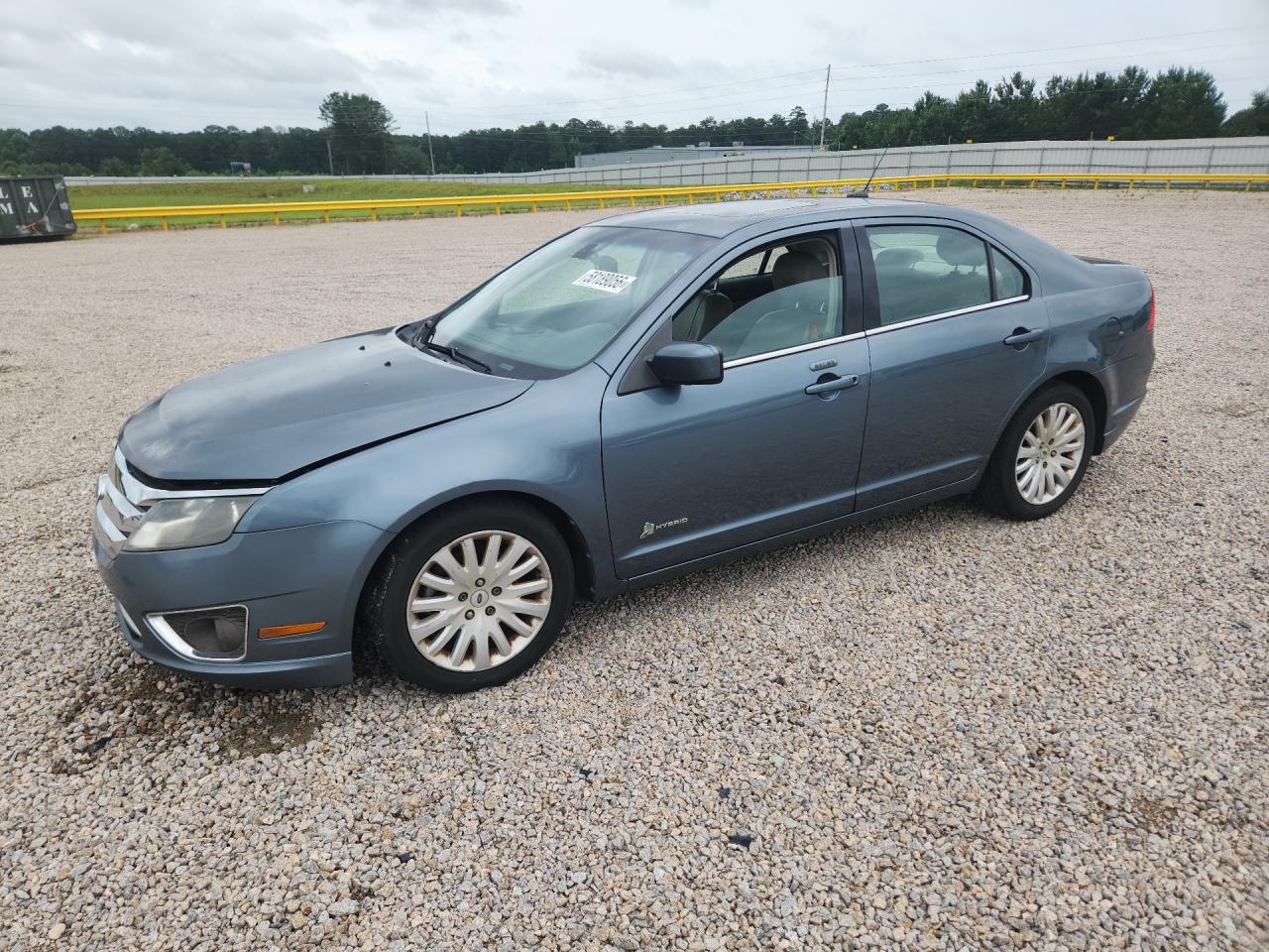 2011 Ford Fusion Hybrid, VIN 3FADP0L32BR277762 — Normal wear