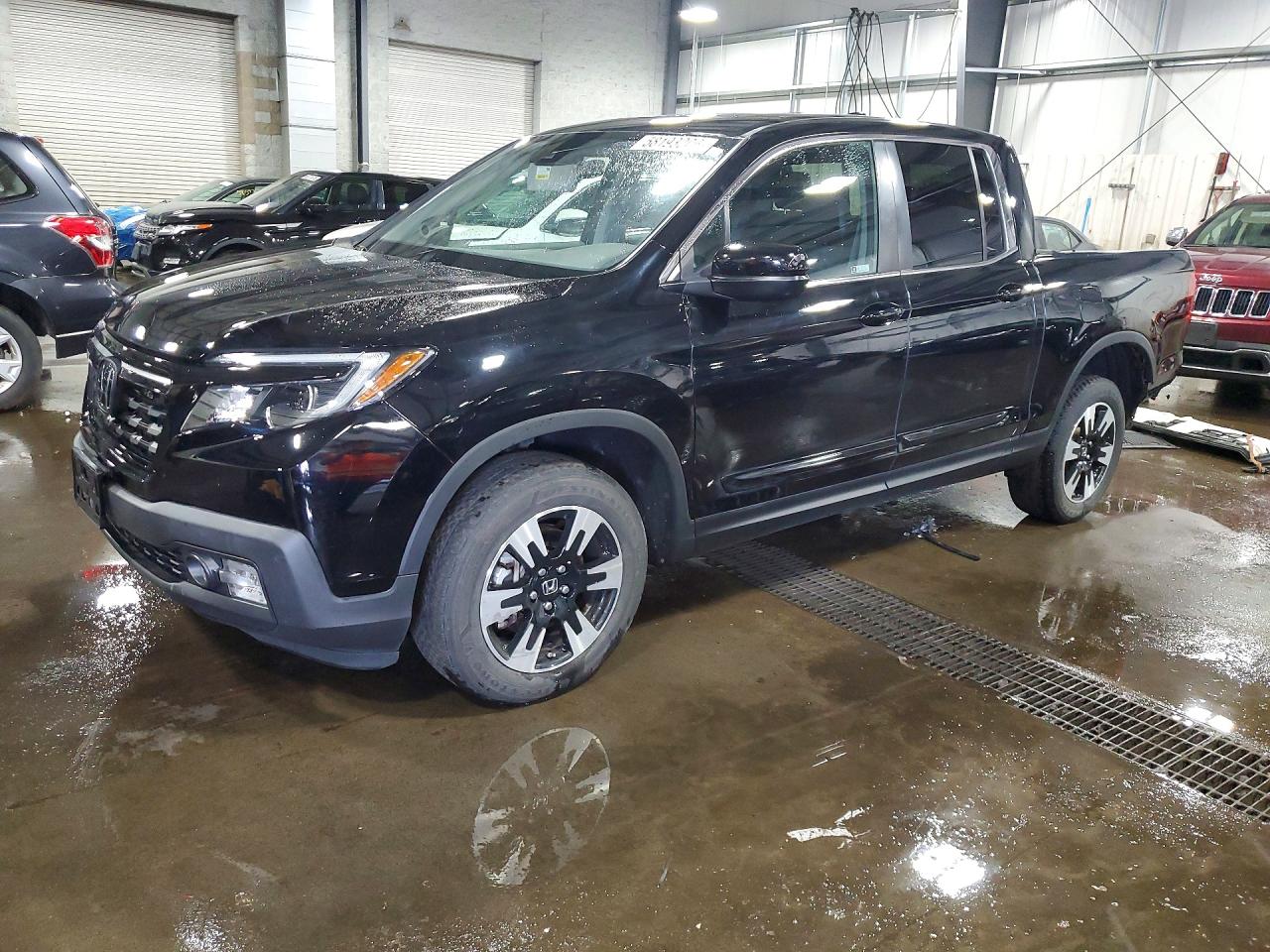 2020 Honda Ridgeline RTL, VIN 5FPYK3F52LB024220 — Rear end