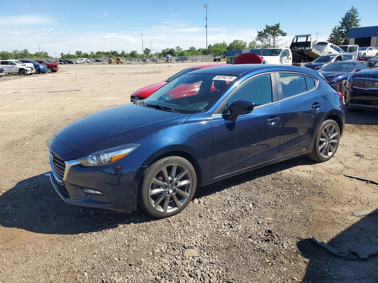 2018 Mazda 3 Touring, VIN 3MZBN1L31JM176847 — Rear end