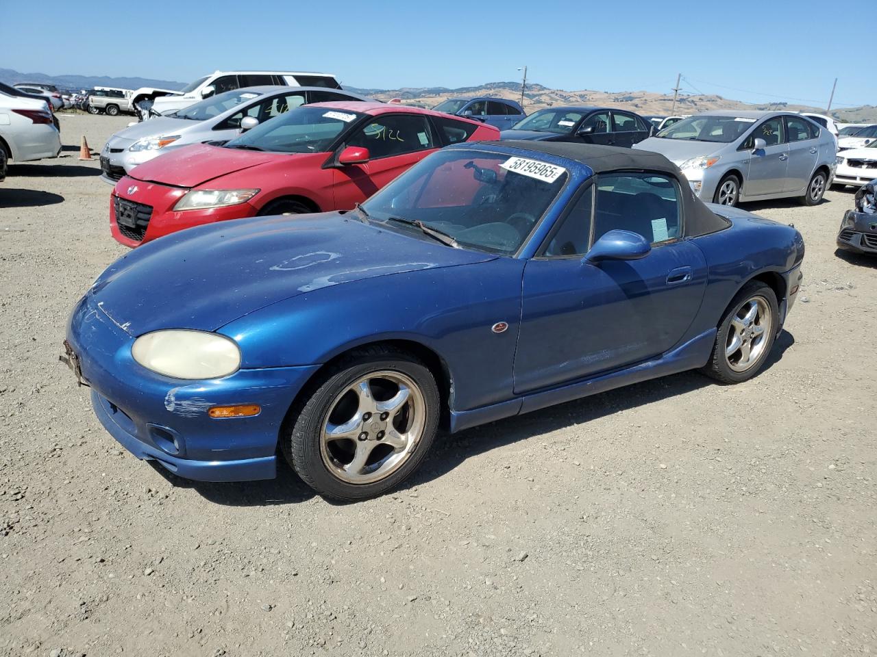 1999 Mazda MX-5 Miata, VIN JM1NB3530X0133727 — Minor dents and scratches