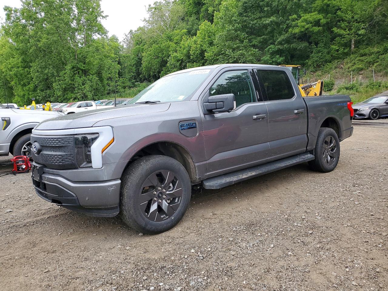 2024 Ford F-150 Lightning Flash, VIN 1FT6W3L7XRWG02336 — Side