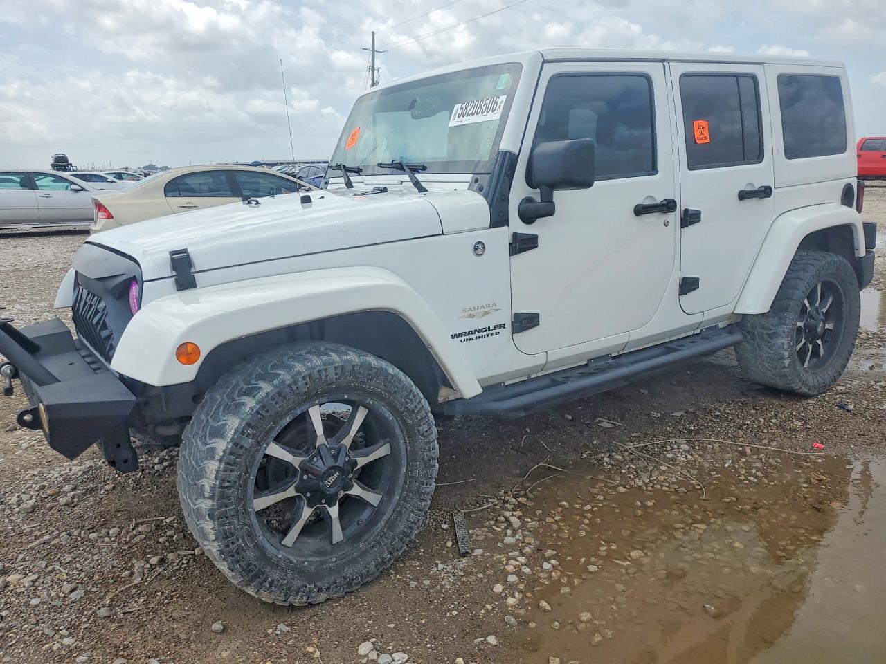 2015 Jeep Wrangler Unlimited Sahara, VIN 1C4BJWEG4FL612210 — Water / flood