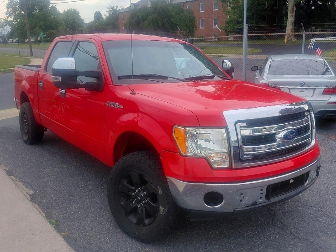 2014 Ford F-150 XLT, VIN 1FTFW1CF8EFC00899 — Prior damage history