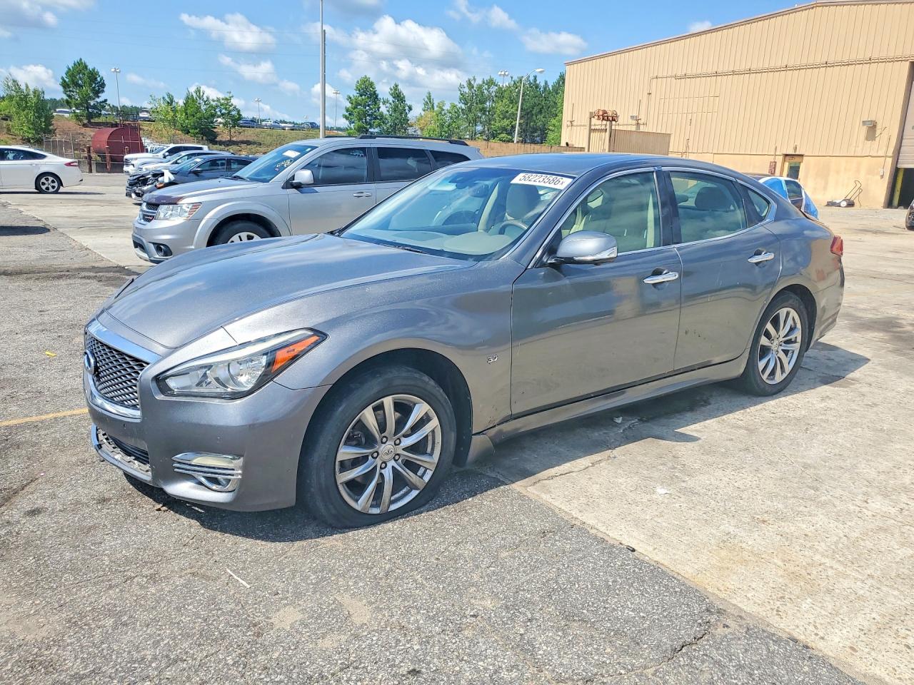 2015 Infiniti Q70, VIN JN1BY1AR9FM560527 — Rear end