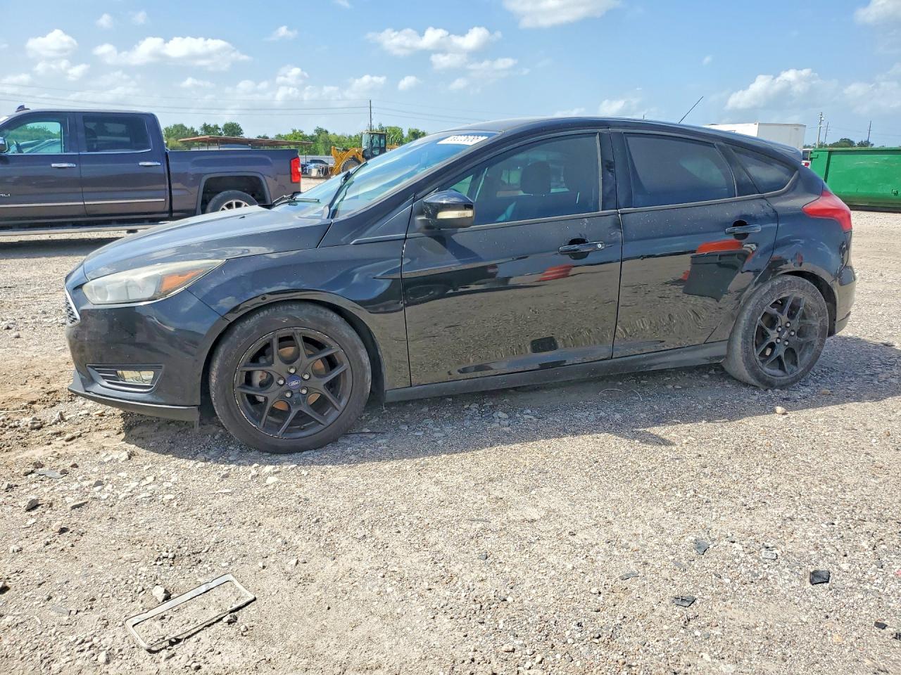2016 Ford Focus SE, VIN 1FADP3K27GL227097 — Water / flood