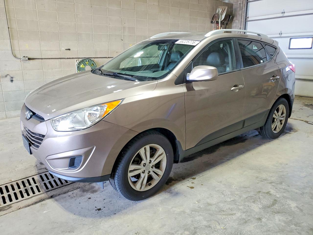 2011 Hyundai Tucson GLS, VIN KM8JUCAC8BU136449 — Undercarriage