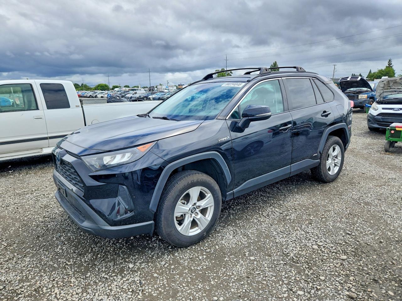 2019 Toyota RAV4 Hybrid LE, VIN 2T3MWRFV3KW038778 — Front end