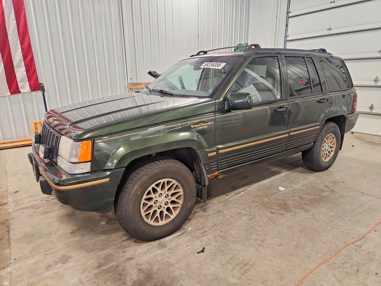 1995 Jeep Grand Cherokee Limited, VIN 1J4GZ78Y0SC528561 — Side