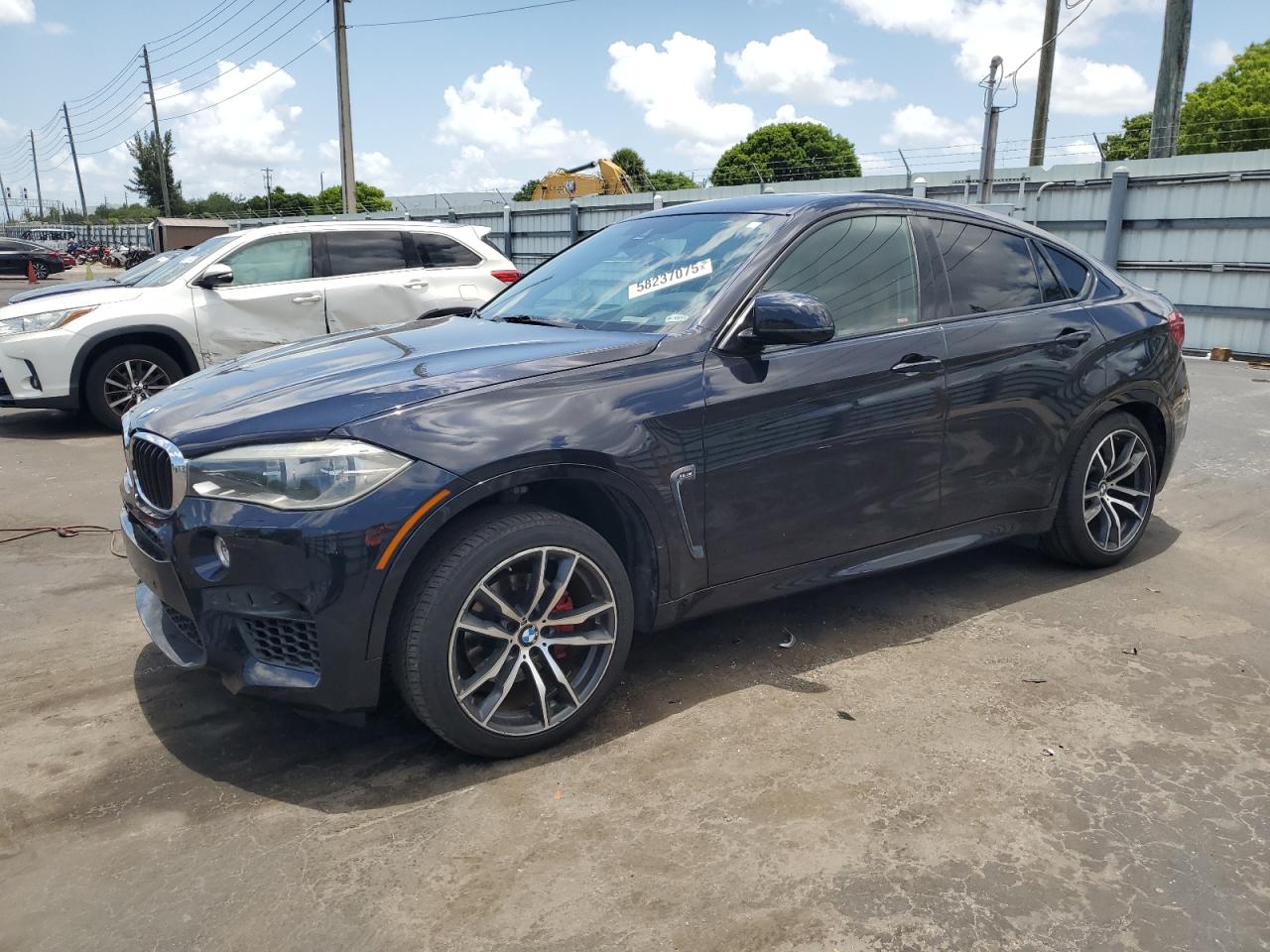 2015 BMW X6 M, VIN 5YMKW8C52F0G93931 — Vandalism