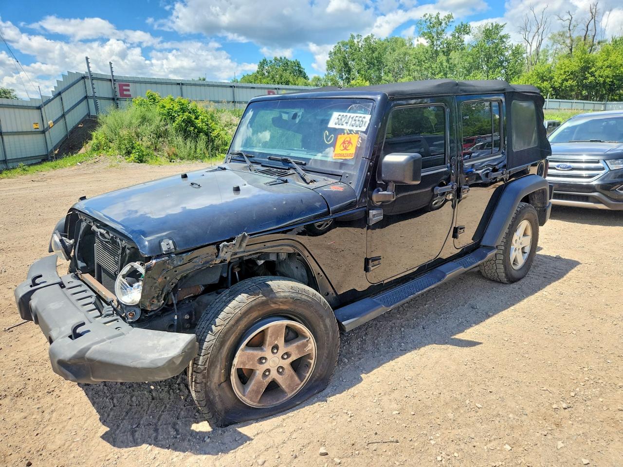 2017 Jeep Wrangler Unlimited Sport, VIN 1C4BJWDG7HL669036 — Front end