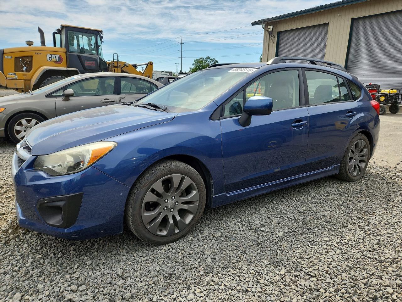 2012 Subaru Impreza Special Sports Premium, VIN JF1GPAL68CG215160 — Side