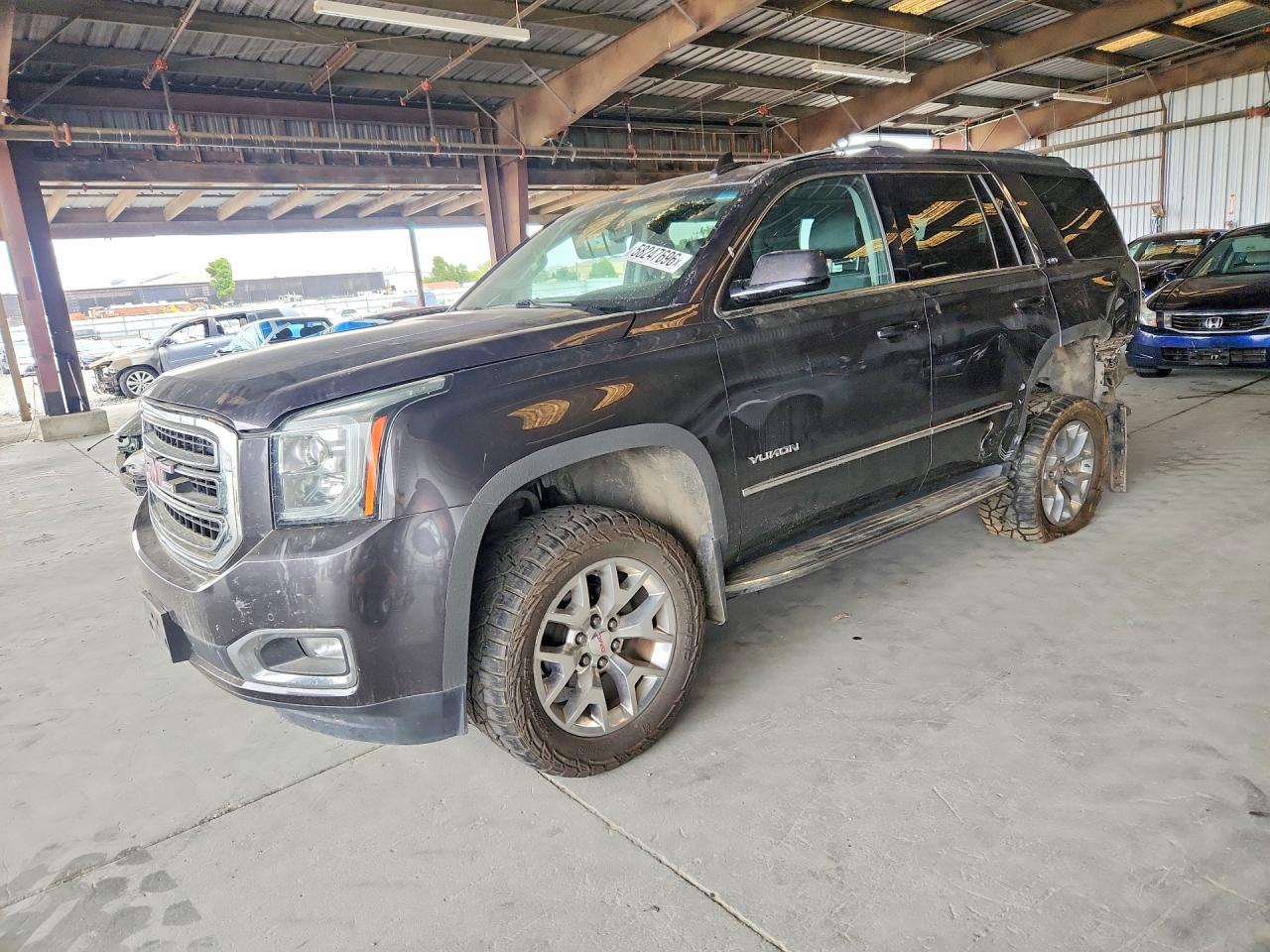 2017 GMC Yukon SLT, VIN 1GKS2BKC7HR214338 — Rear end
