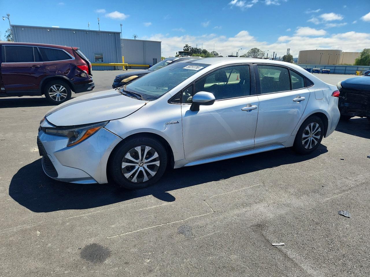 2021 Toyota Corolla Hybrid LE, VIN JTDEAMDE0MJ034505 — Rear end