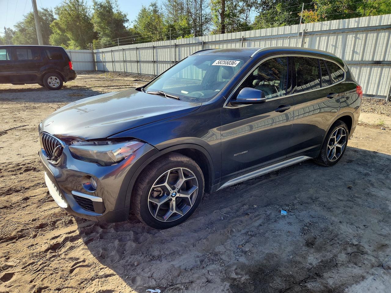 2018 BMW X1 sDrive28i, VIN WBXHU7C35J5H41762 — Front end