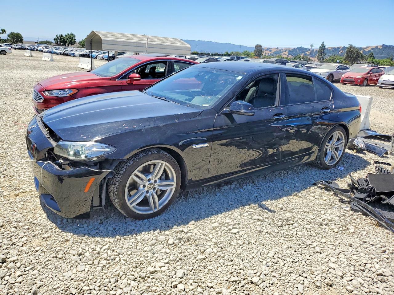 2016 BMW 5 Series 535i, VIN WBA5B1C50GG131859 — Side