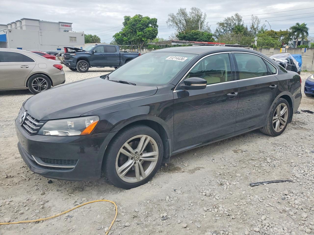 2014 Volkswagen Passat SE, VIN 1VWBN7A36EC028688 — Vandalism