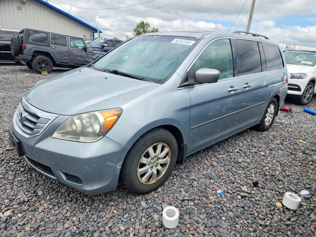 2010 Honda Odyssey EX-L, VIN 5FNRL3H78AB044106 — Normal wear