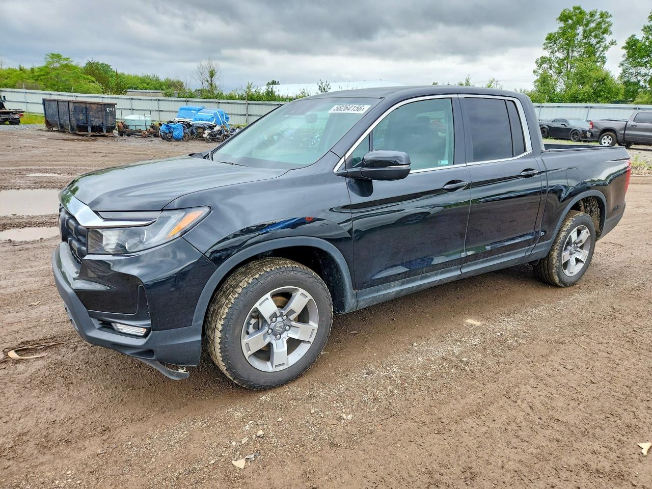 2025 Honda Ridgeline RTL, VIN 5FPYK3F50SB049938 — Hail