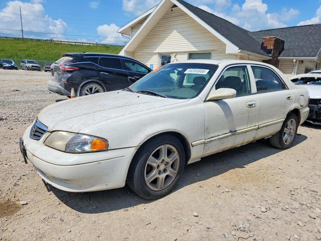 2001 Mazda 626 LX, VIN 1YVGF22D815203452 — Water / flood