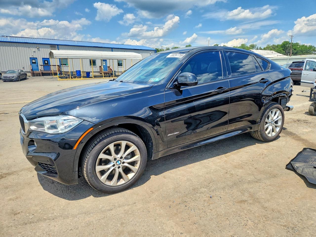 2018 BMW X6 xDrive35i, VIN 5UXKU2C53J0X49259 — Зад