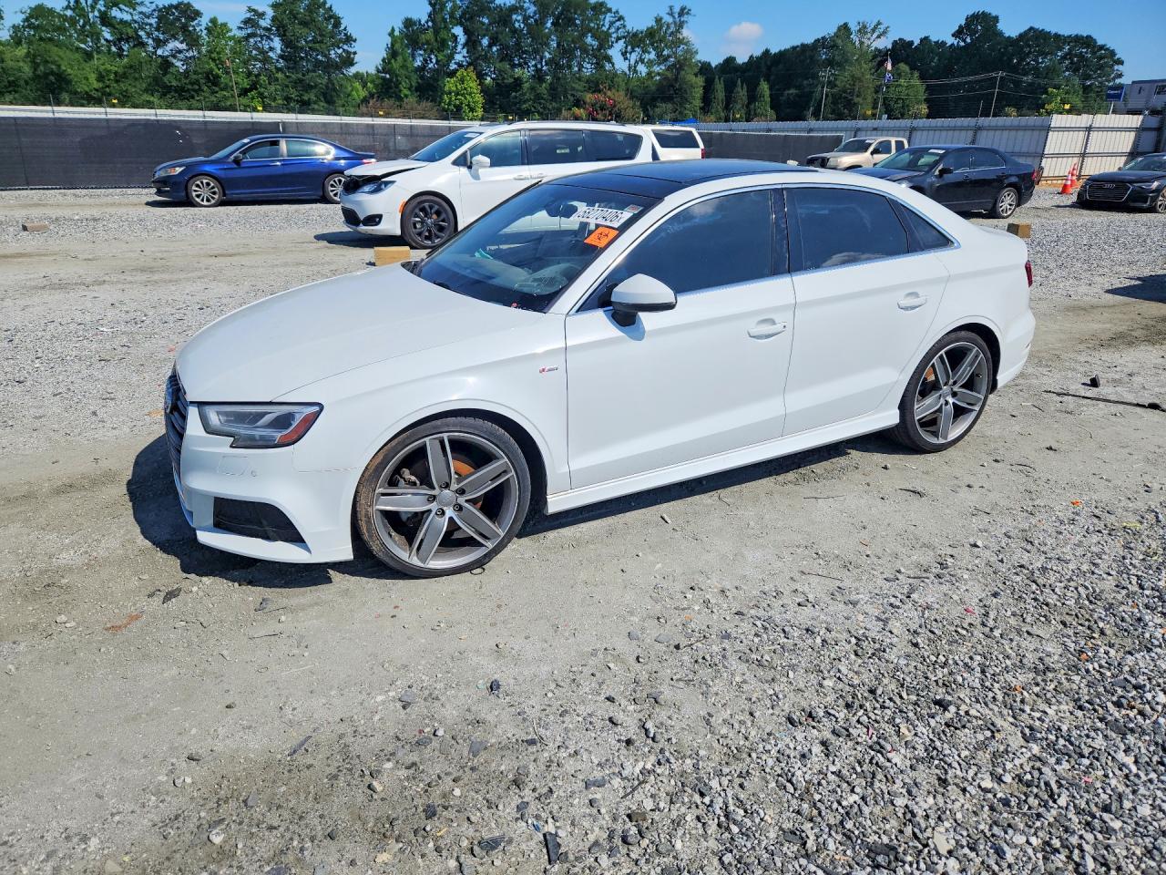 2019 Audi A3 Premium Plus, VIN WAUGUGFF3KA062915 — Бок