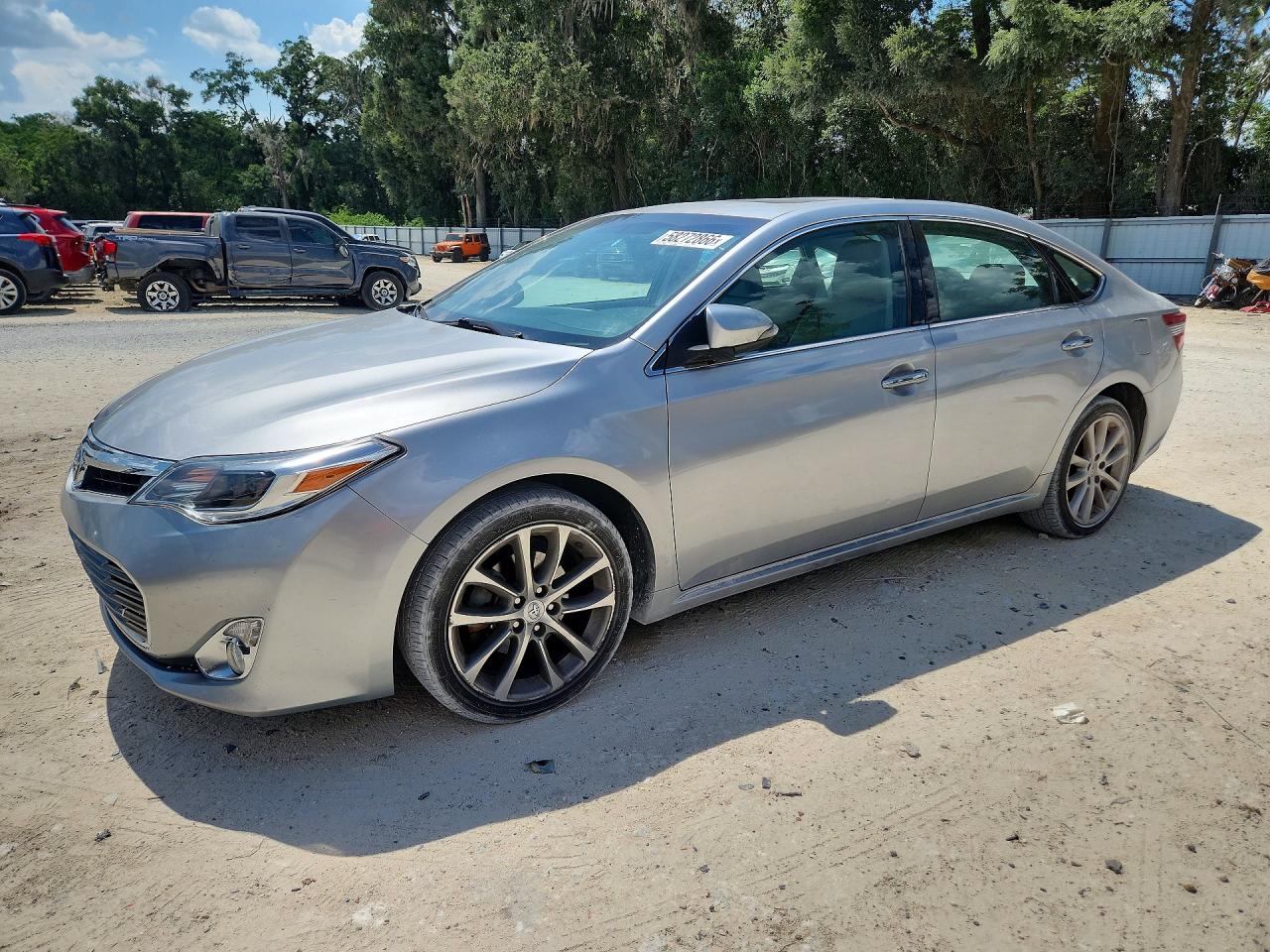 2015 Toyota Avalon XLE Touring, VIN 4T1BK1EB9FU184225 — Side