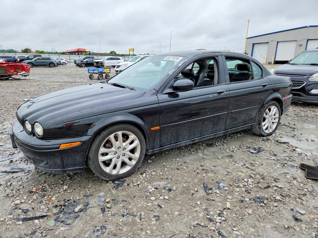 2002 Jaguar X-Type Sport, VIN SAJEA53D22XC47890 — Side