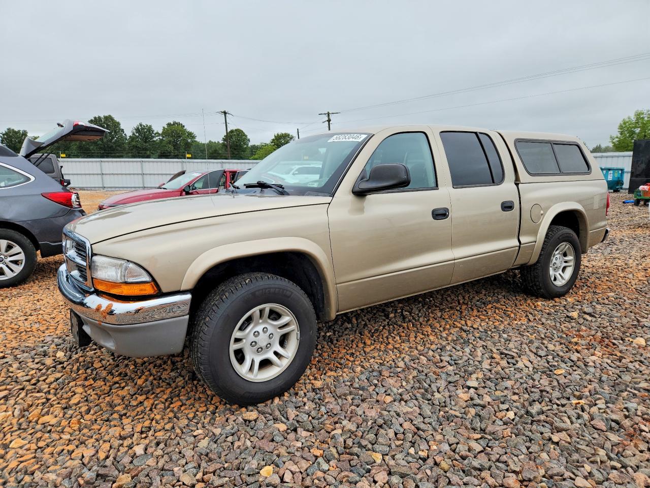 2004 Dodge Dakota SLT, VIN 1D7HL48N64S761424 — Side