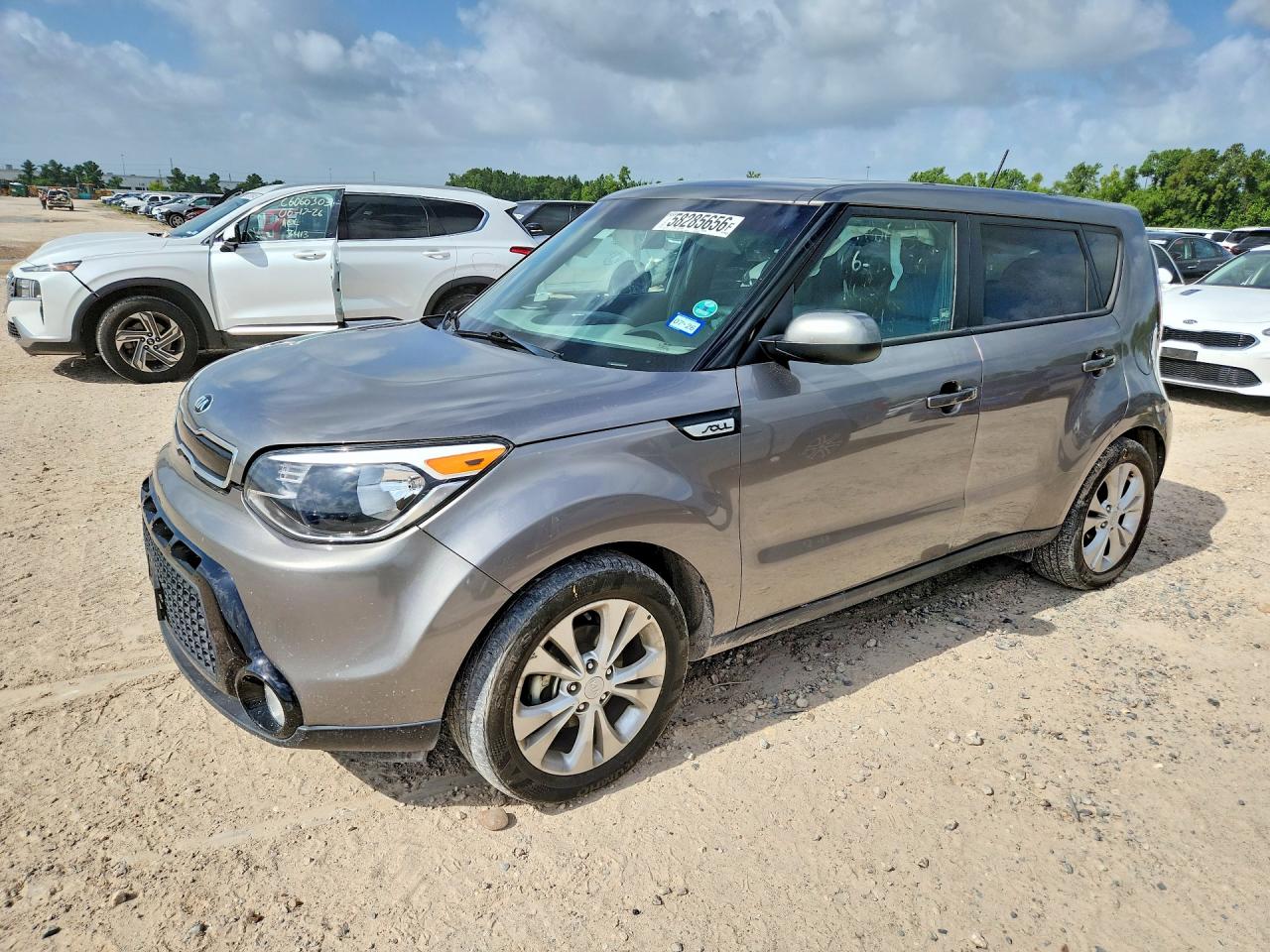 2016 Kia Soul +, VIN KNDJP3A50G7306046 — Side