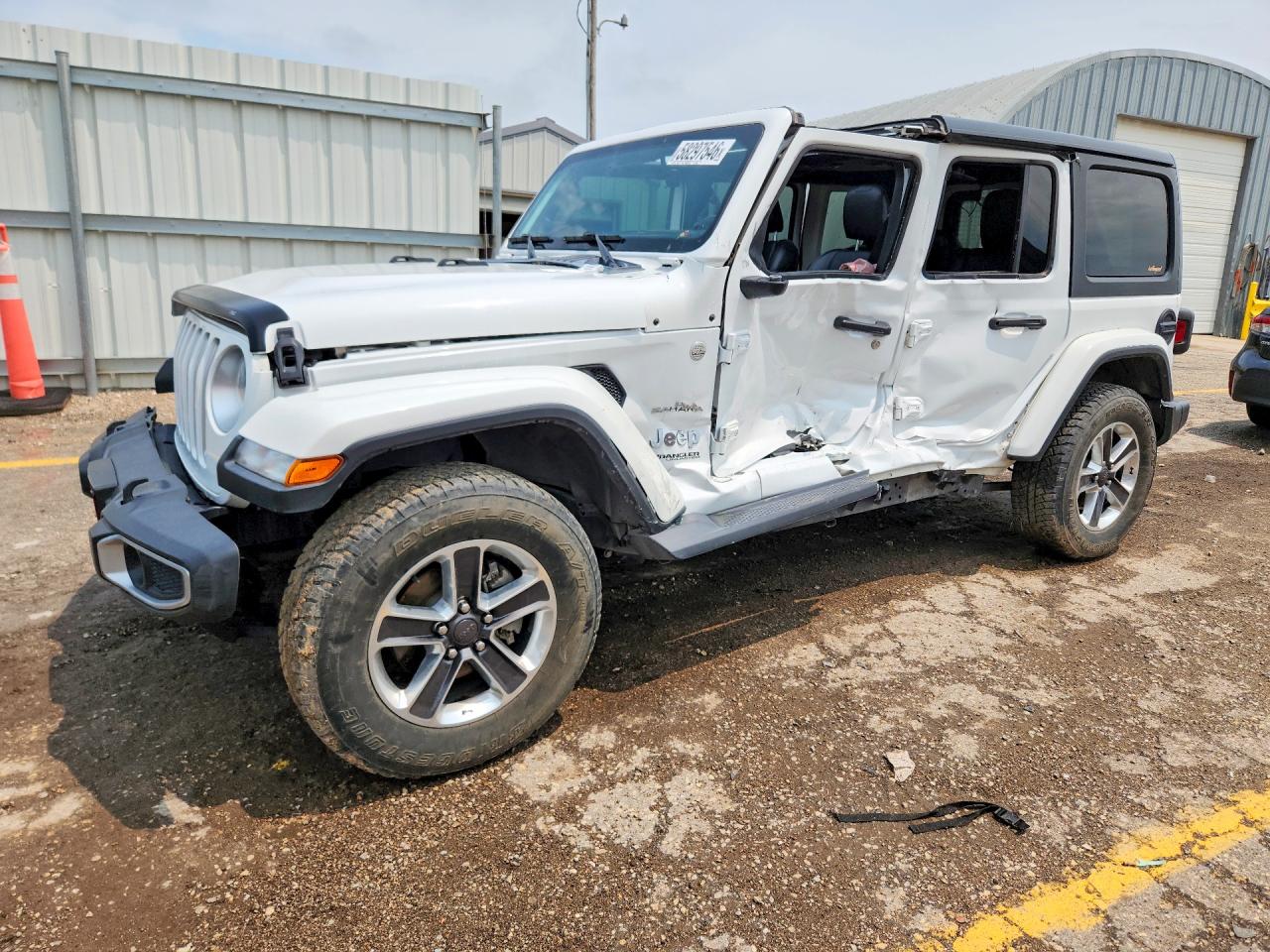 2018 Jeep Wrangler Unlimited Sahara, VIN 1C4HJXEN7JW328690 — Side