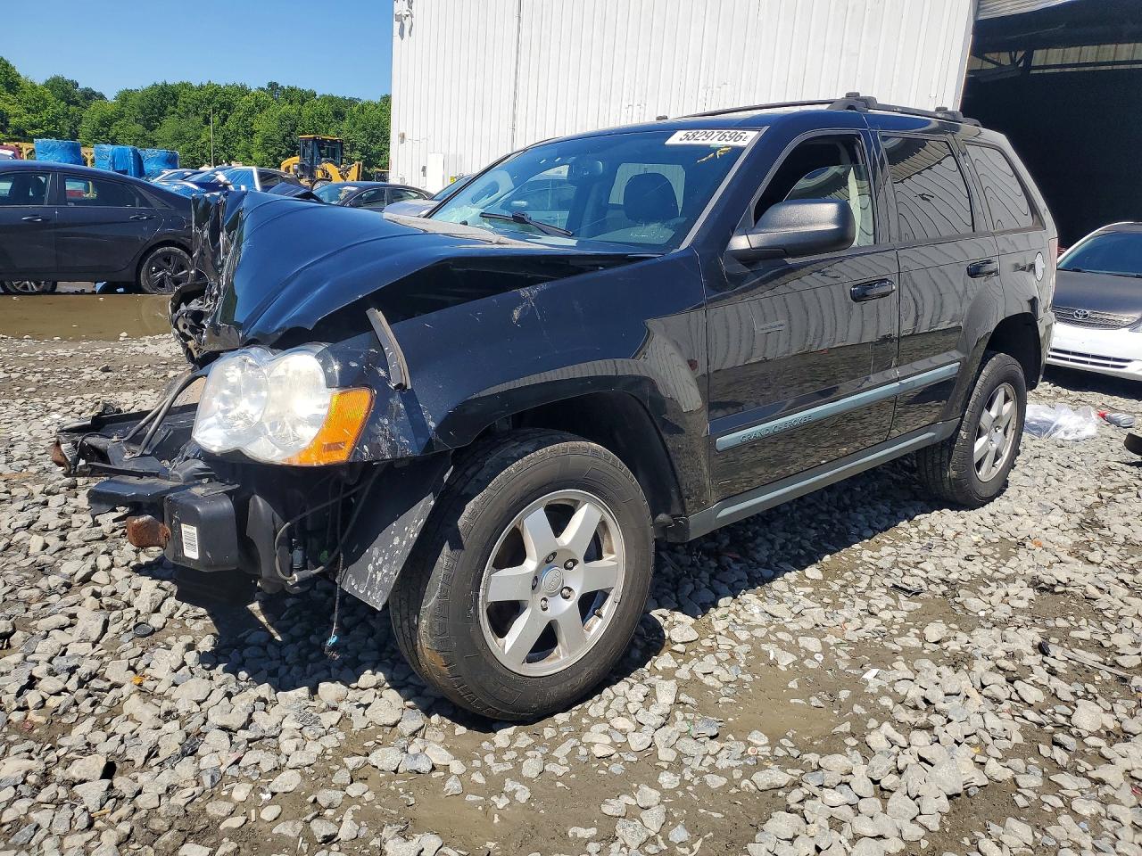 2008 Jeep Grand Cherokee Laredo, VIN 1J8GR48K38C219684 — Front end