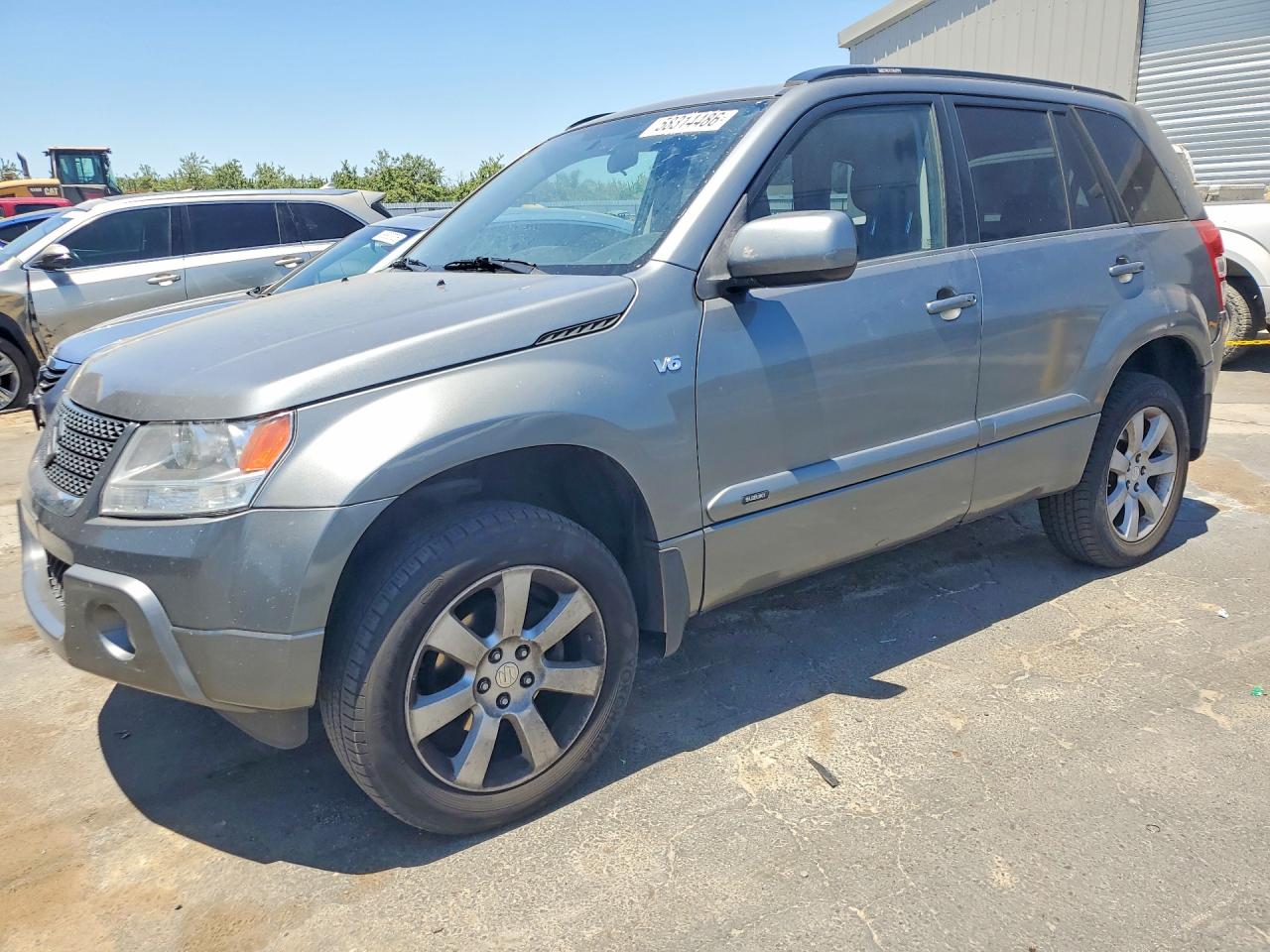 2009 Suzuki Grand Vitara, VIN JS3TD149294100379 — Зад