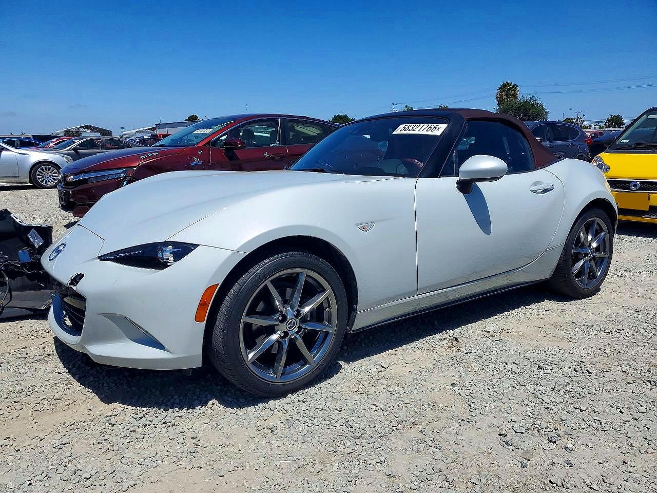2018 Mazda MX-5 Miata Grand Touring, VIN JM1NDAD75J0203877 — Front end