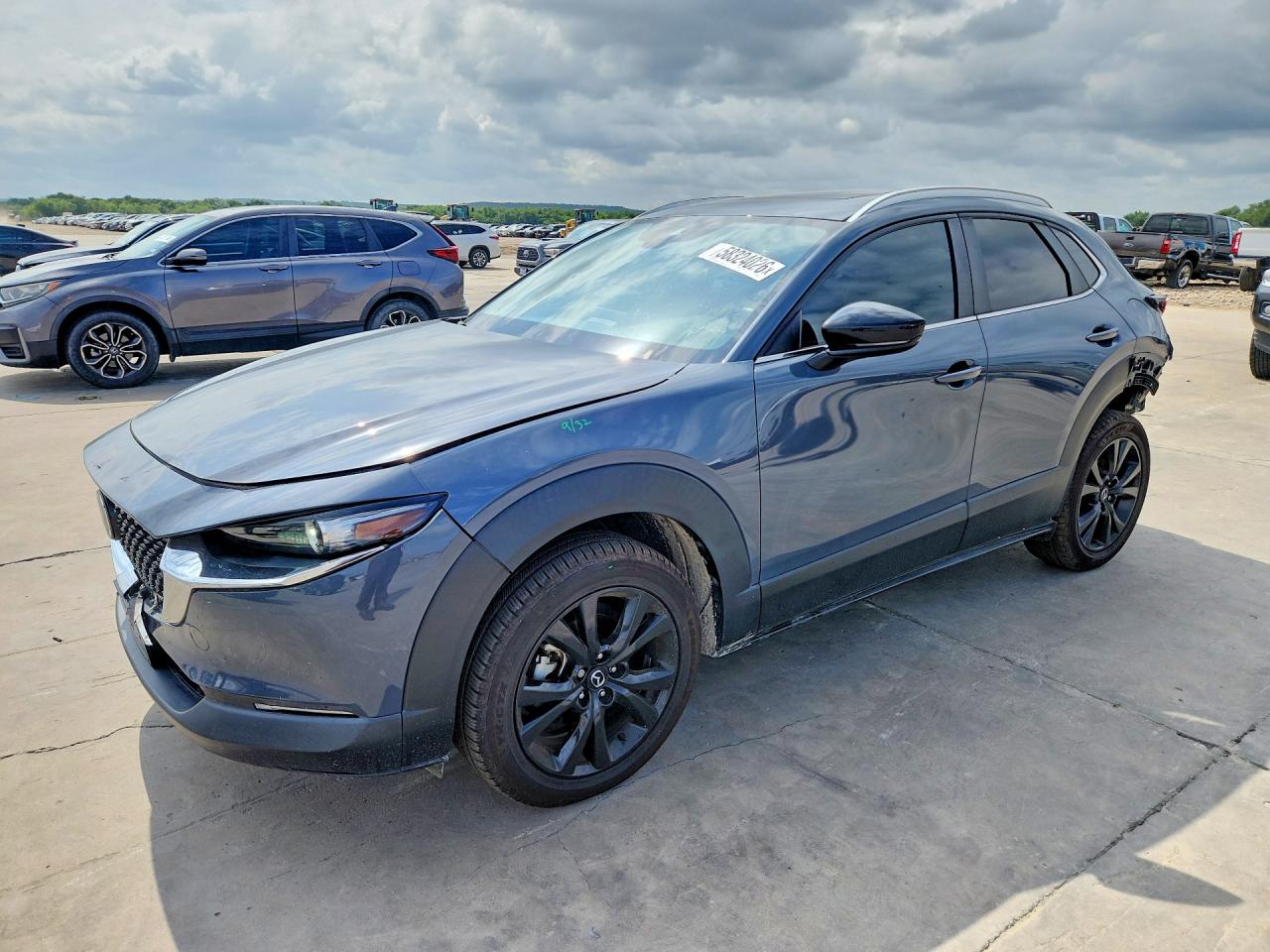 2022 Mazda CX-30 S Carbon Edition, VIN 3MVDMBCL4NM419673 — Rear end